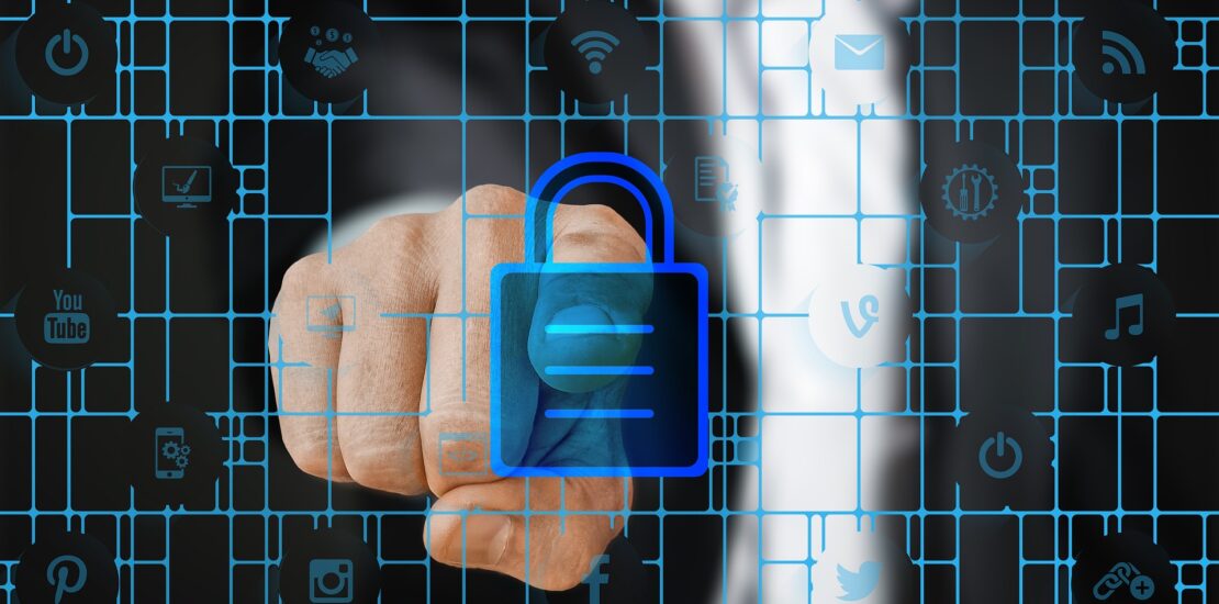 Image shows a padlock in a tech grid to demonstrate the importance of IT Security