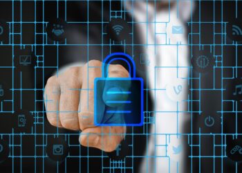 Image shows a padlock in a tech grid to demonstrate the importance of IT Security